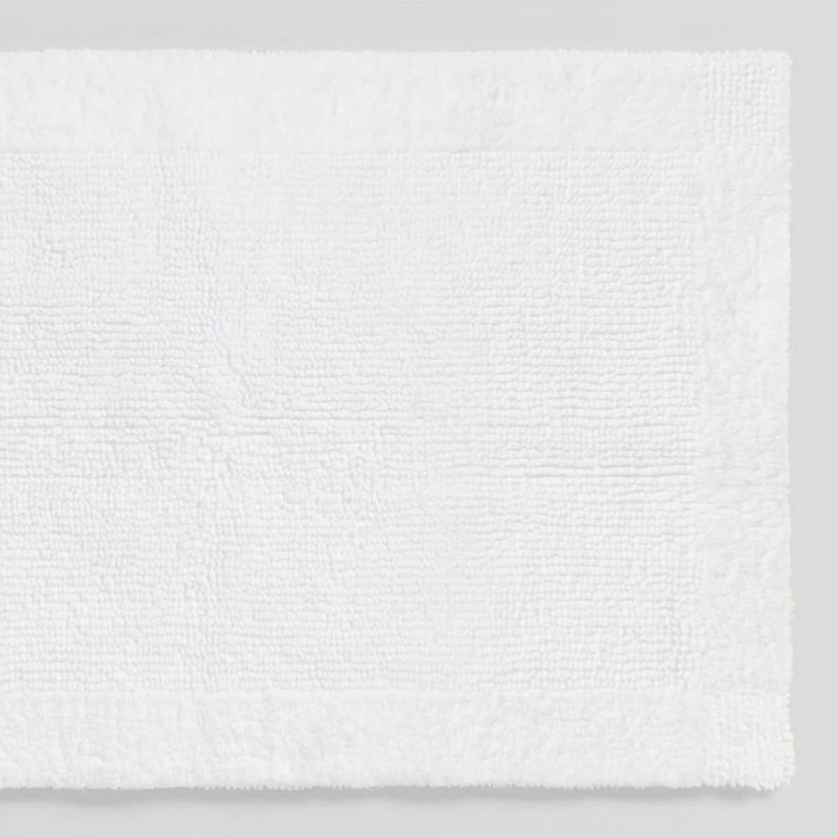 Larken Bath Tufted Rugs in White