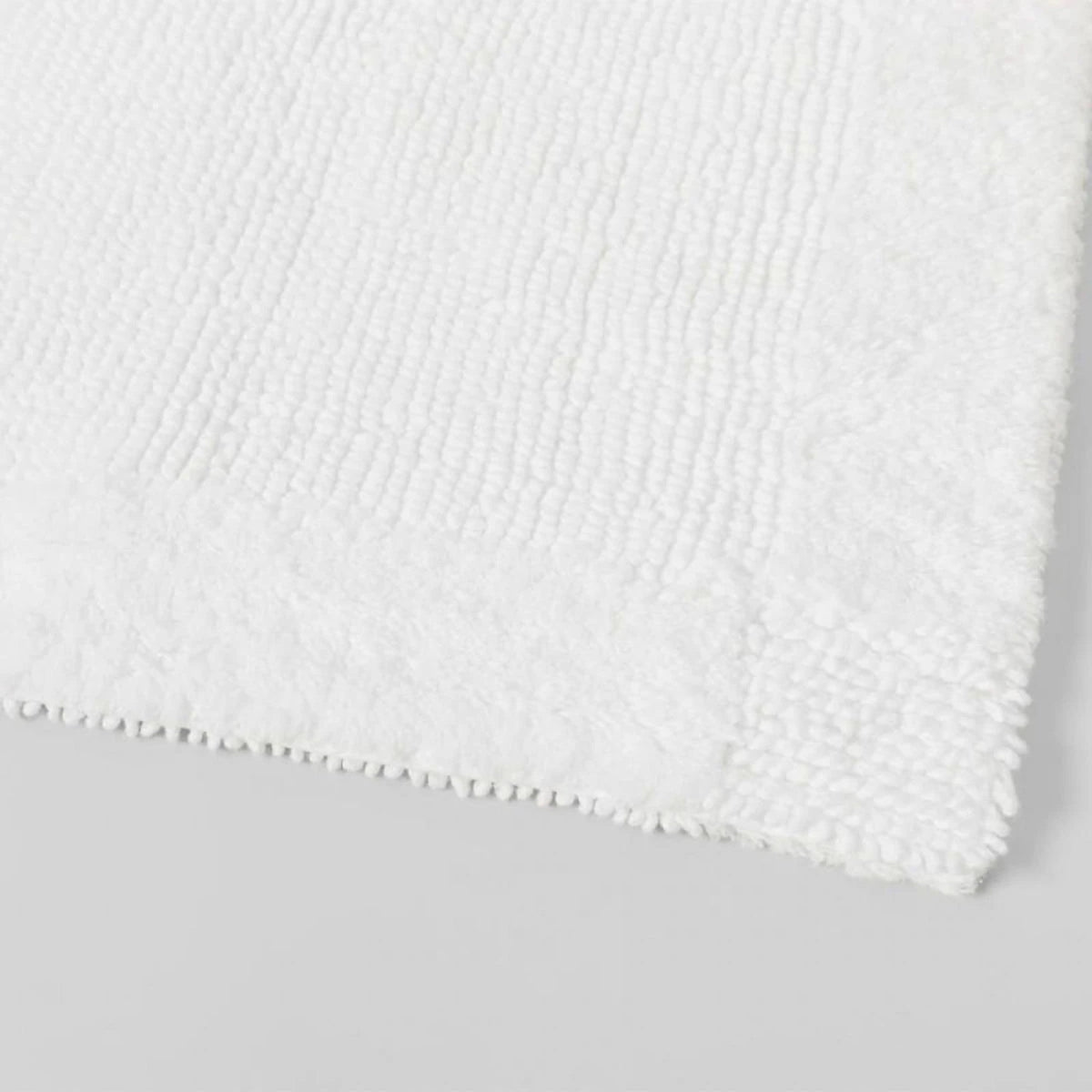 Larken Bath Tufted Rugs in White